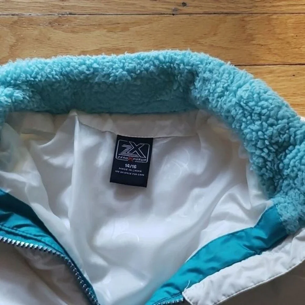 Girls winter Jacket size 14/16. White with green trim.